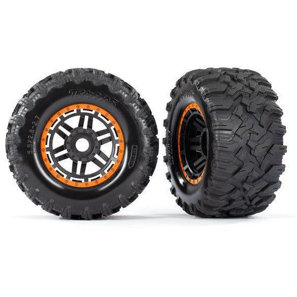 TRA8972T Tires & wheels, assembled, glued (black, orange beadlock style wheels, Maxx MT tires, foam inserts) (2) (17mm splined) (TSM rated